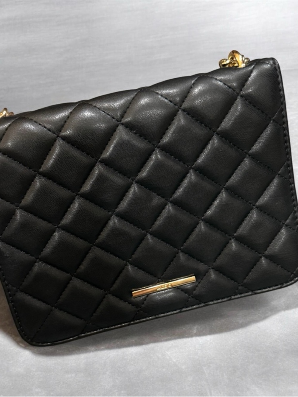 Aldo Black Quilted Crossbody with Gold Bar Detail